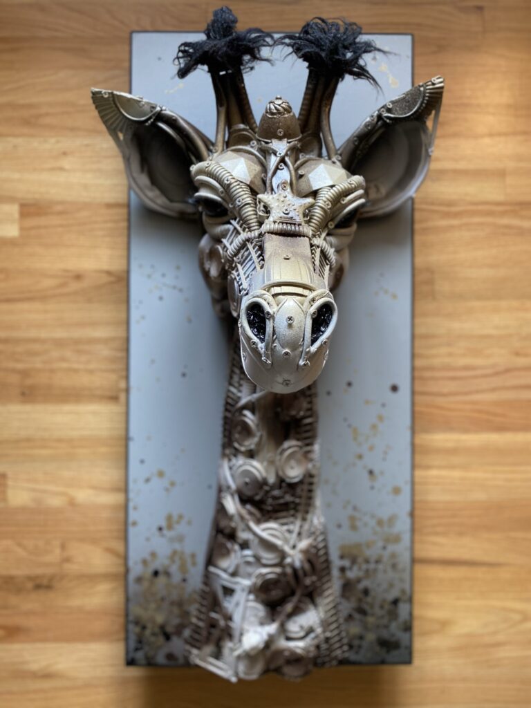 a giraffe sculpture by the artist Stephanie Hongo