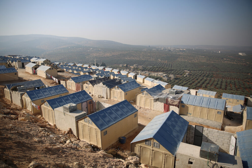 An image of a line of Better Shelter homes in Syria