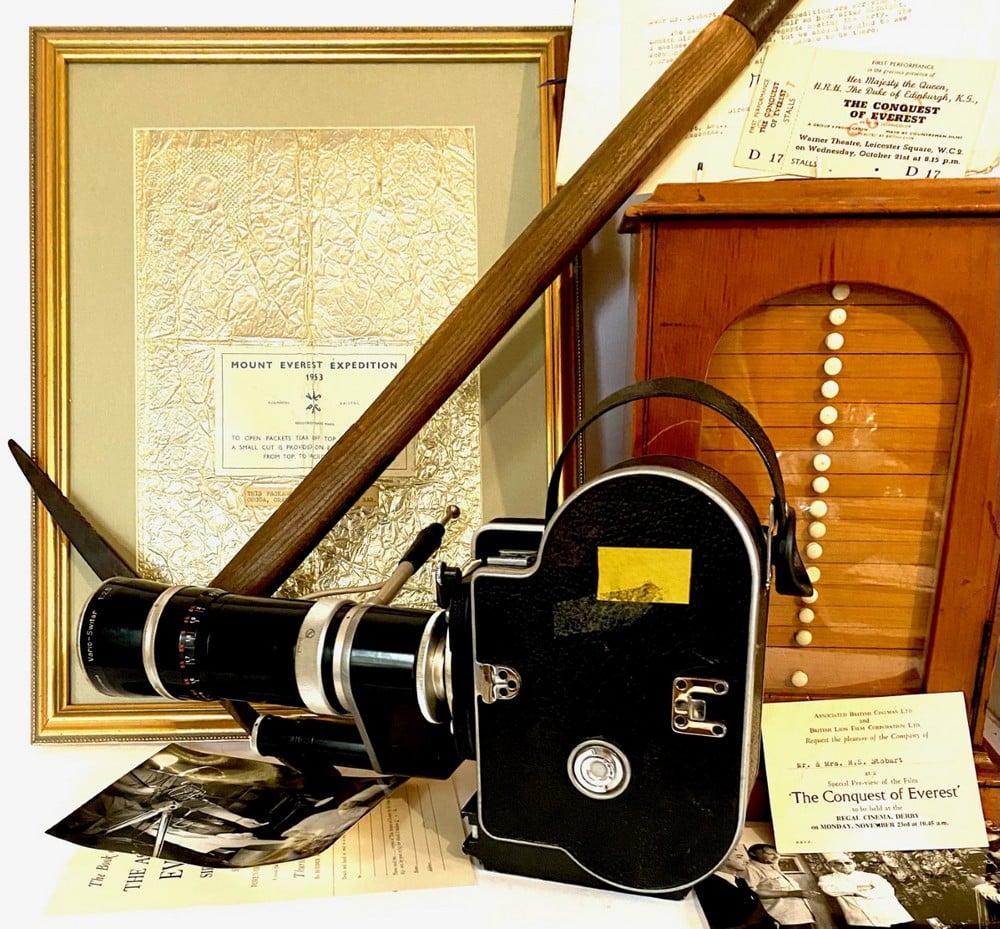 an image shows a tool, a camera, and other mementos from the 1953 Mt. Everest expedition