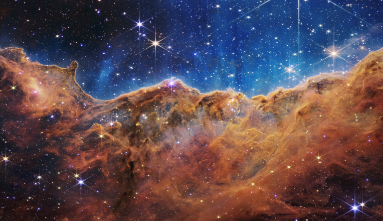 James Webb Telescope Capture of the Carina Nebula, gaseous clouds resembling mountain peaks