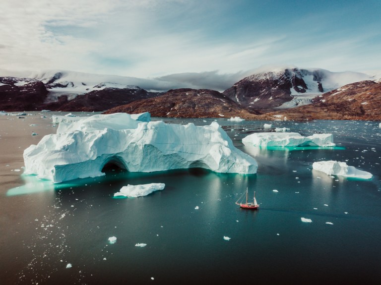 This arial captures the impressive scale of glaciers and icebergs in East Greenland on a sailing expedition in autumn 2017.