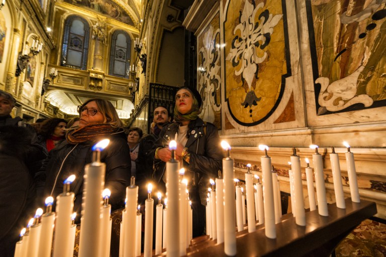 Montevergine (AV) Italy Women praying inside the sanctuary on Candlemas.