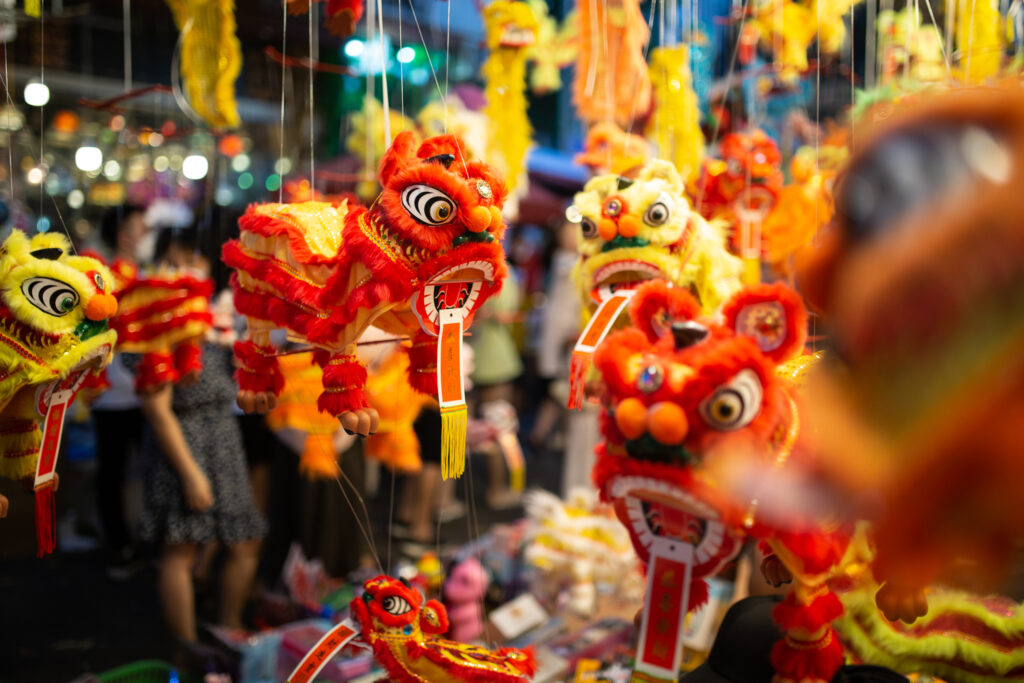 Dragon toys appear for sale at a stall during the Mid-Autumn Festival on Hang Ma street in Hanoi, Vietnam