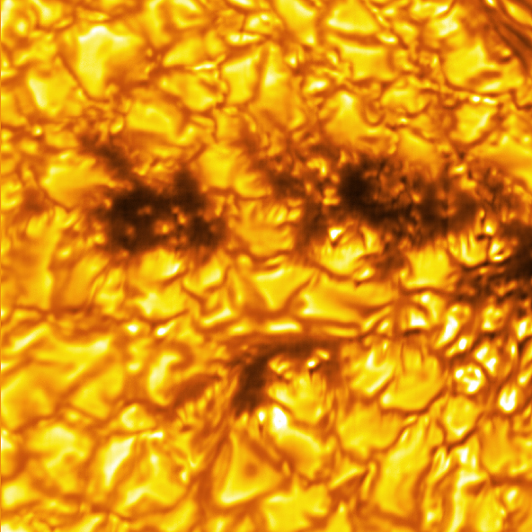 A sunspot is identifiable by its dark, central umbra and surrounding filamentary-structured penumbra. A closer look reveals the presence of nearby umbral fragments – essentially, a sunspot that’s lost its penumbra. These fragments were previously a part of the neighboring sunspot, suggesting that this may be the “end phase” of a sunspot’s evolution. While this image shows the presence of umbral fragments, it is extraordinarily rare to capture the process of a penumbra forming or decaying. Umbra: Dark, central region of a sunspot where the magnetic field is strongest. Penumbra: The brighter, surrounding region of a sunspot’s umbra characterized by bright filamentary structures.